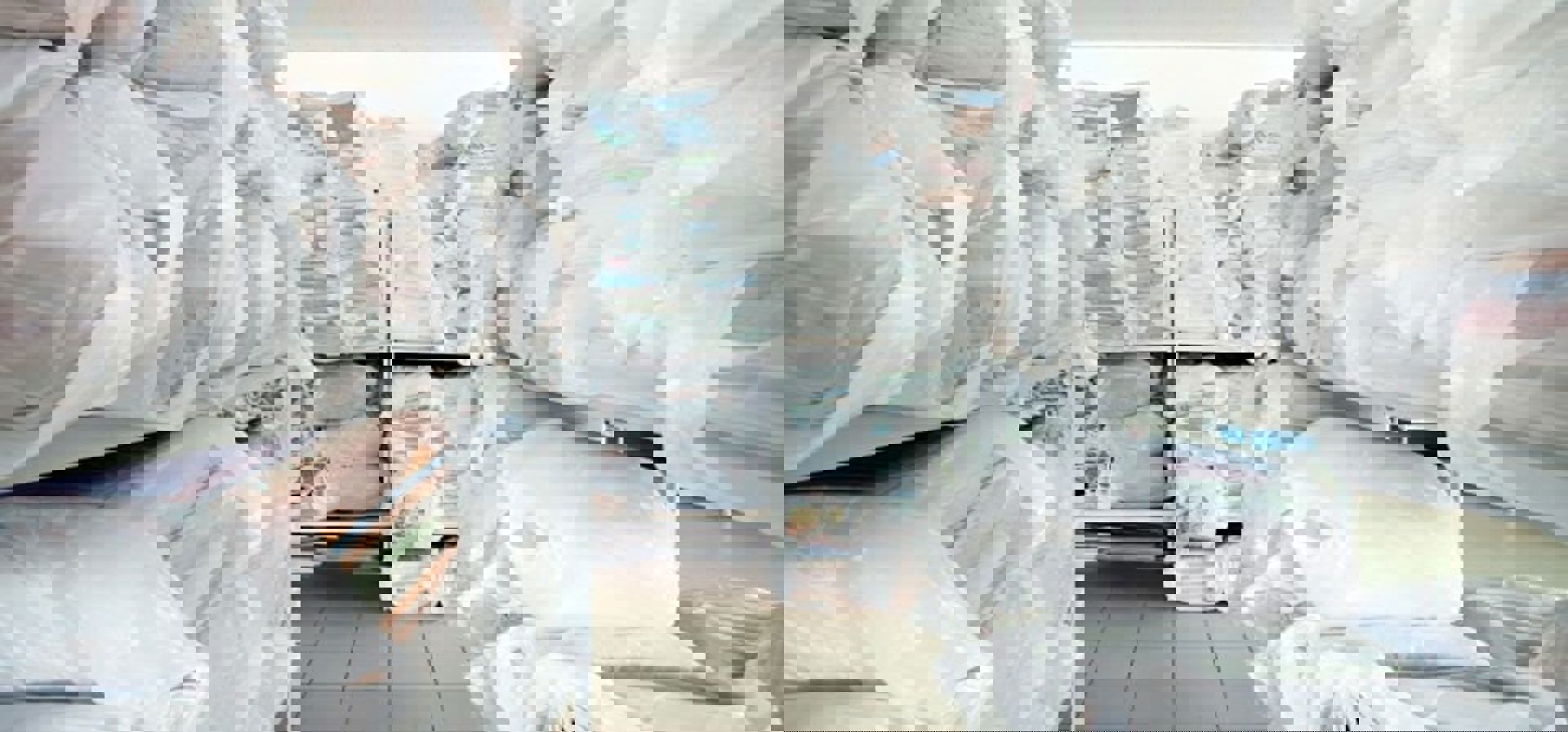 Racks Of Clean Commercial Laundry Min