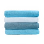 Towels Folded On White Background Min