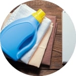 Detergent And Notepad On Towels Min